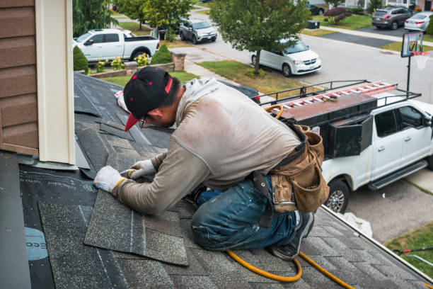 Professional Roof Replacement technician working in Worcester, MA